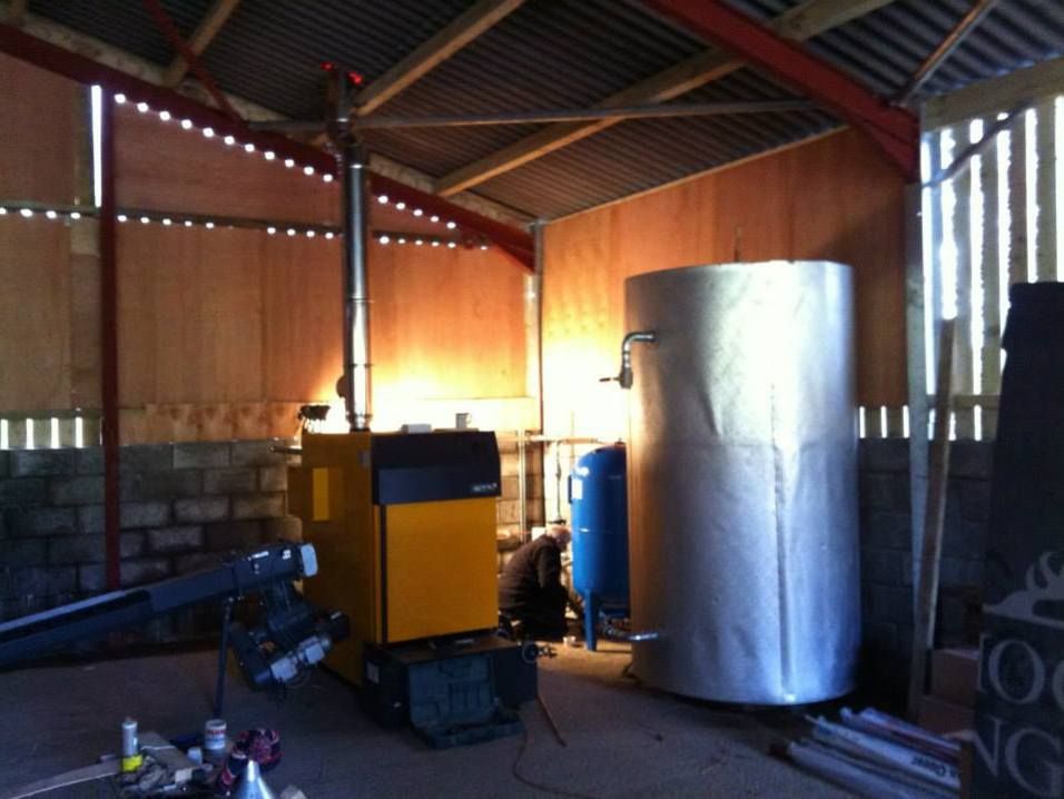 Boiler and buffer tank in a barn