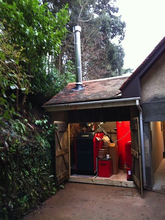Oil boiler installed in an outbuilding boiler house