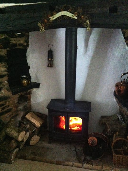 Woodburner installed in a cottage inglenook